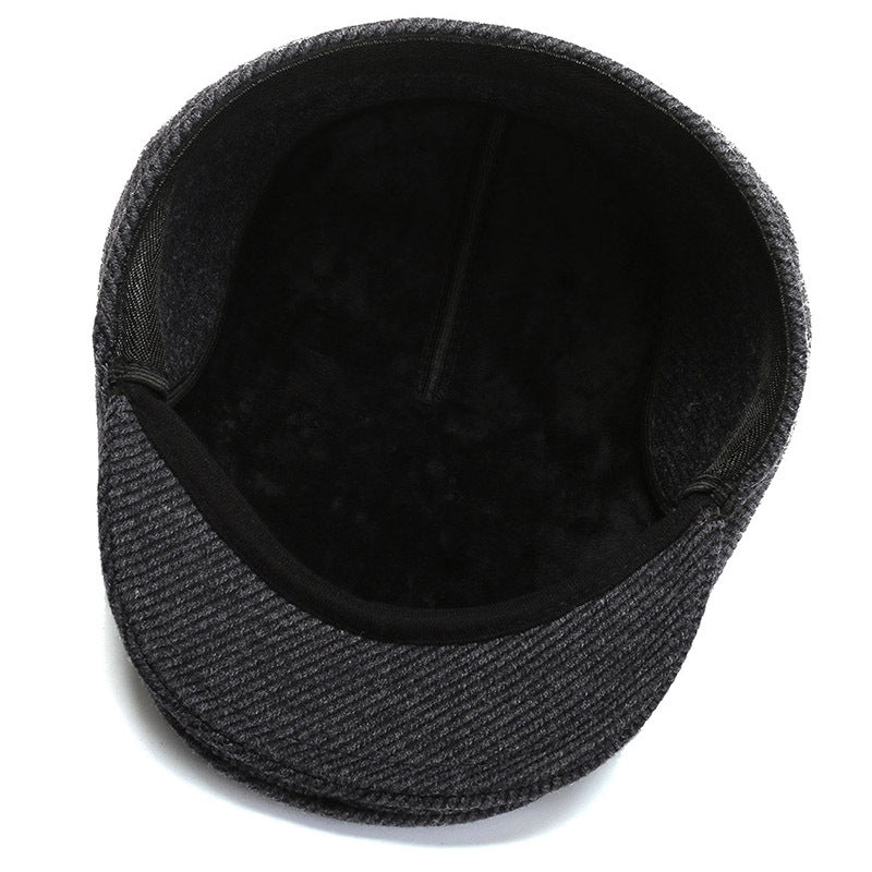 Stylish black duckbill cap worn by model