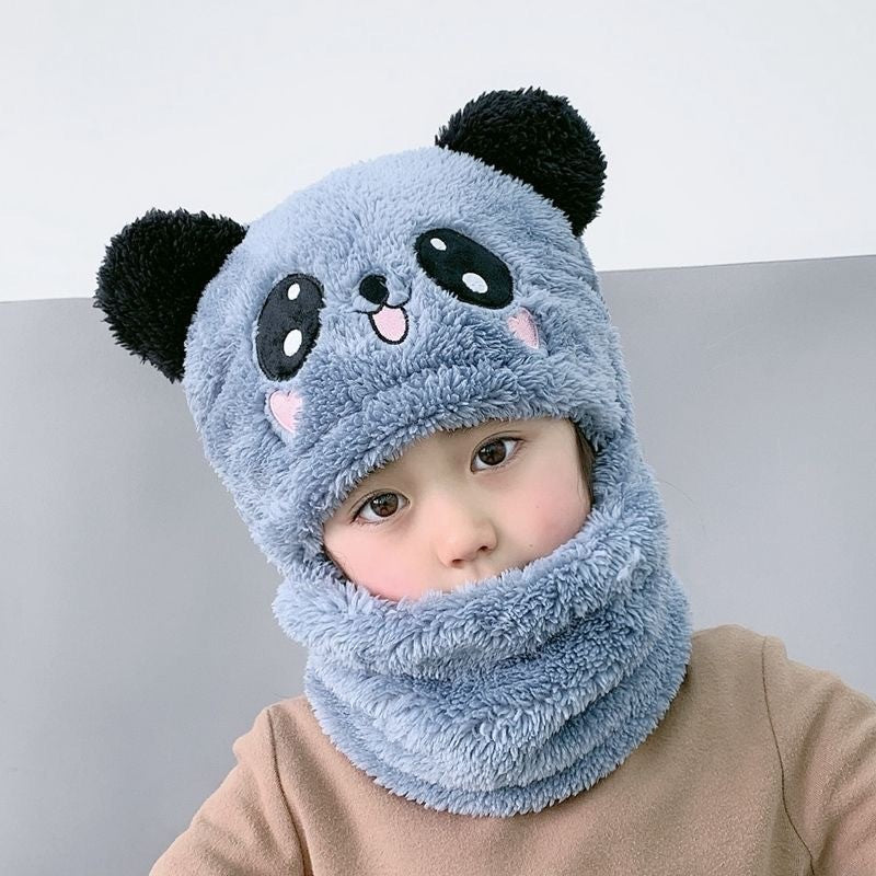 Children enjoying outdoor activities in winter wear