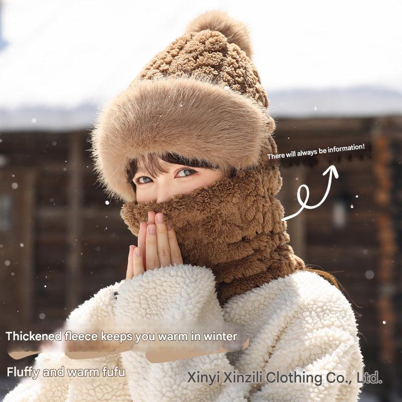 Brown riding hat with protective ear warmers
