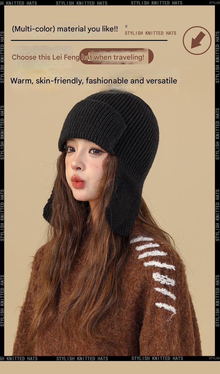 Stylish beanie and gloves in dark grey