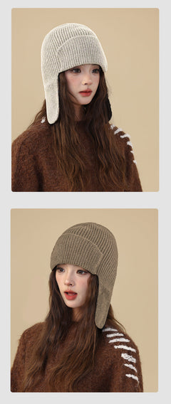 Cosy knit beanie set on a winter backdrop