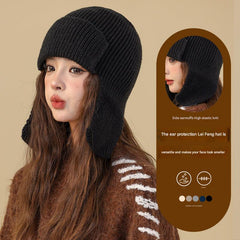 Stylish beanie and gloves in dark grey