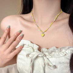 elegant floral necklace styled outfit