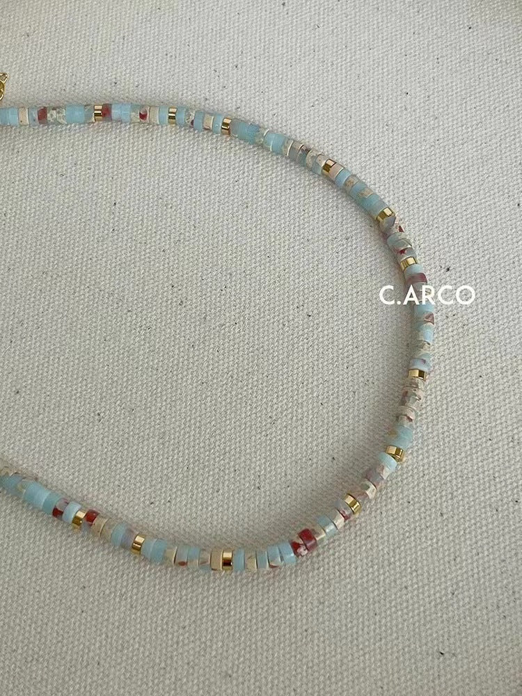 Close-up of beaded Shoushan Stone necklace
