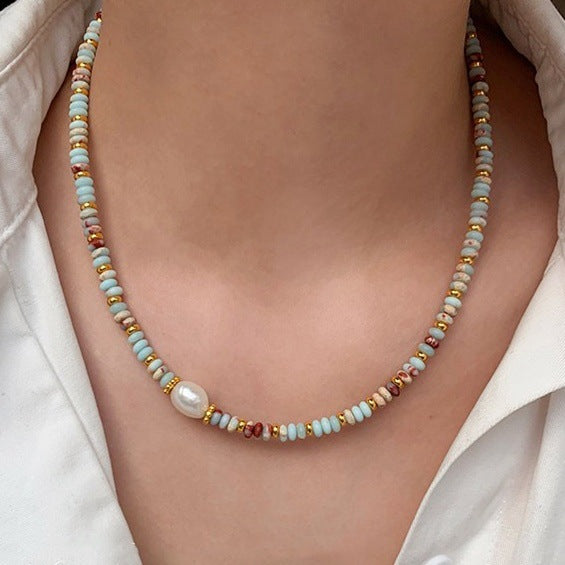 Handcrafted necklace with ethnic charm