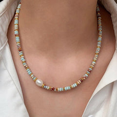 Handcrafted necklace with ethnic charm
