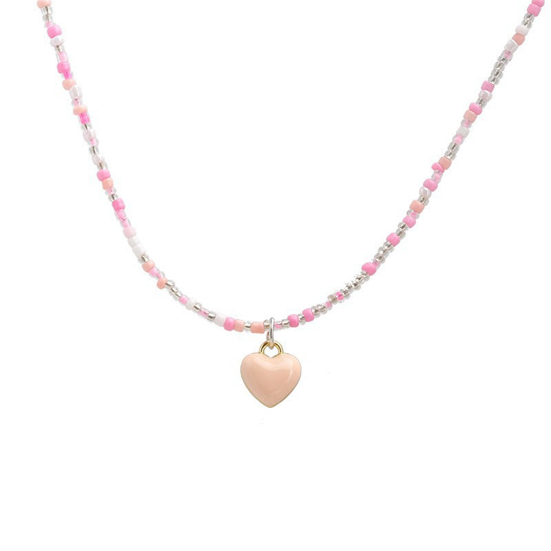 Star charm detail on colourful bead necklace