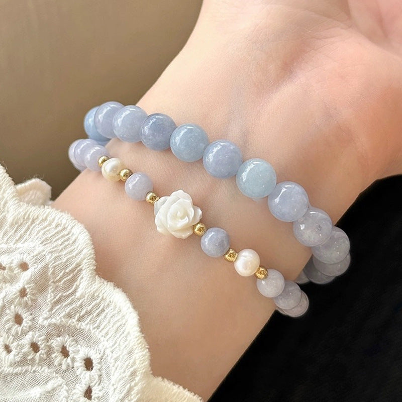 close up image of handcrafted blue beaded bracelet