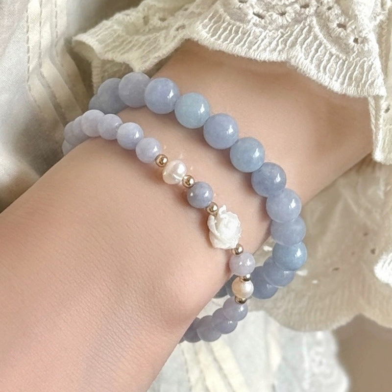 elegant camellia flower bracelet on display
