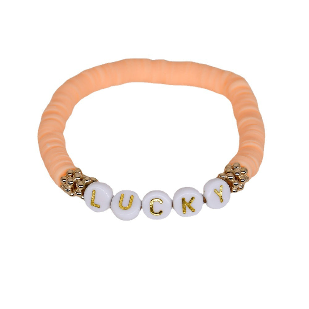 Trendy women's friendship bracelet displayed on a table