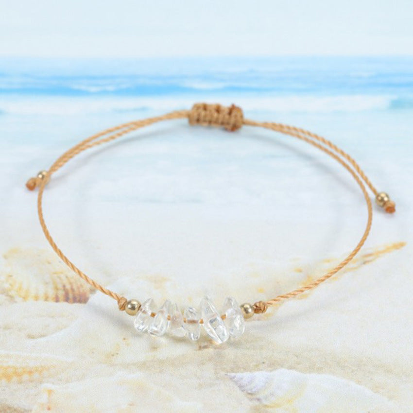 Elegant handcrafted bracelet displayed on wooden surface