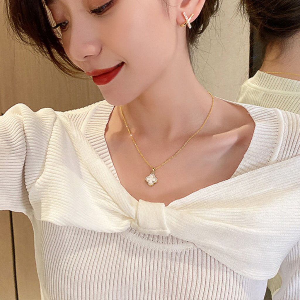 Elegant floral necklace beautifully displayed on hanger
