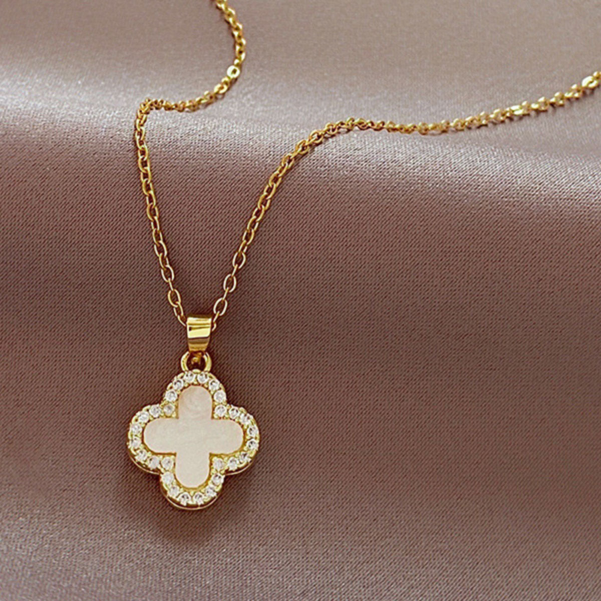Elegant floral necklace beautifully displayed on hanger