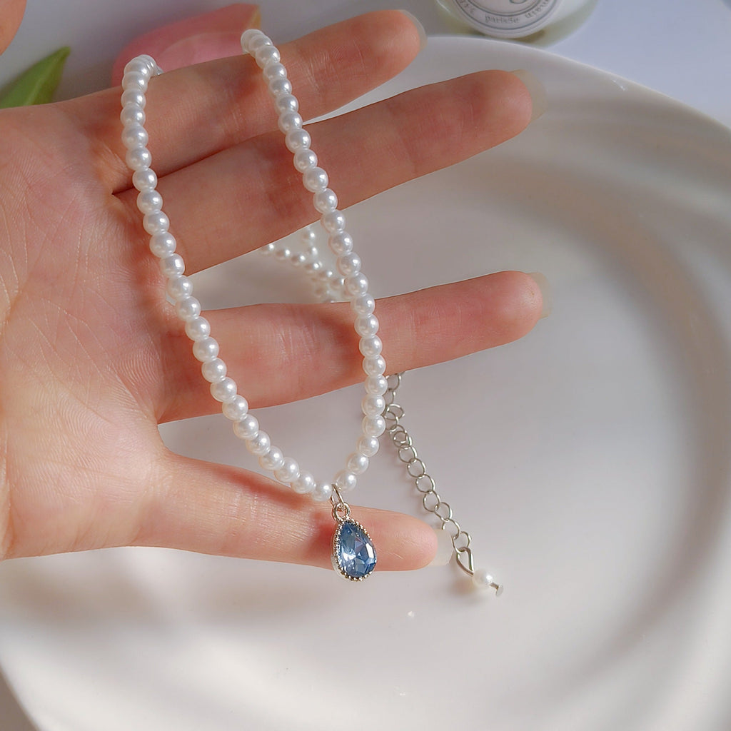 Elegant blue waterdrop pearl necklace displayed