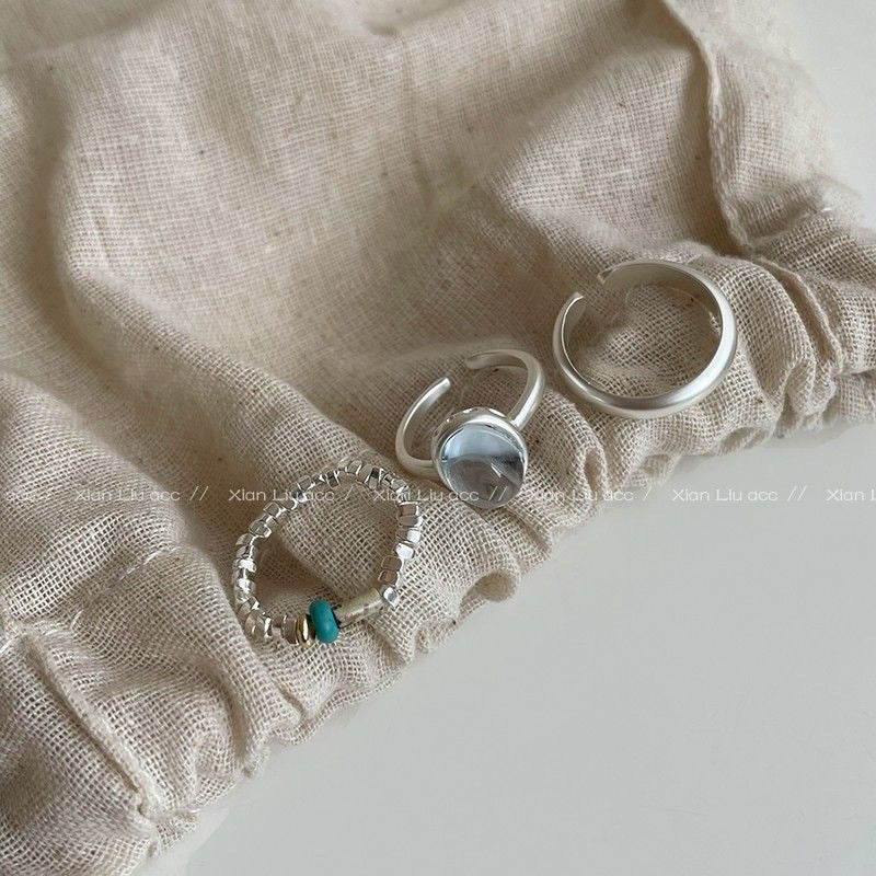 Stylish open finger ring showcasing blue tear