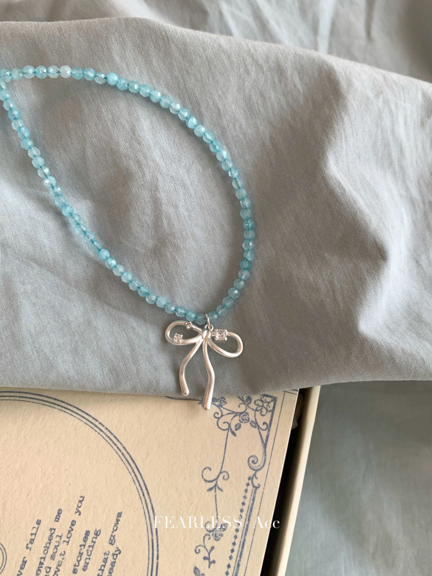 Cute bowknot necklace showcased on display