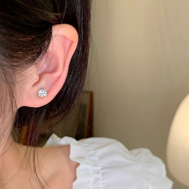 elegant zircon ear studs in gold colour