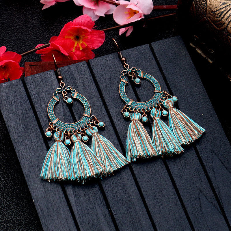 showcasing the lightweight design of tassel earrings