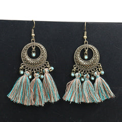 pair of chic Bohemian earrings on display