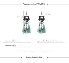 close-up of tassel earrings highlighting details