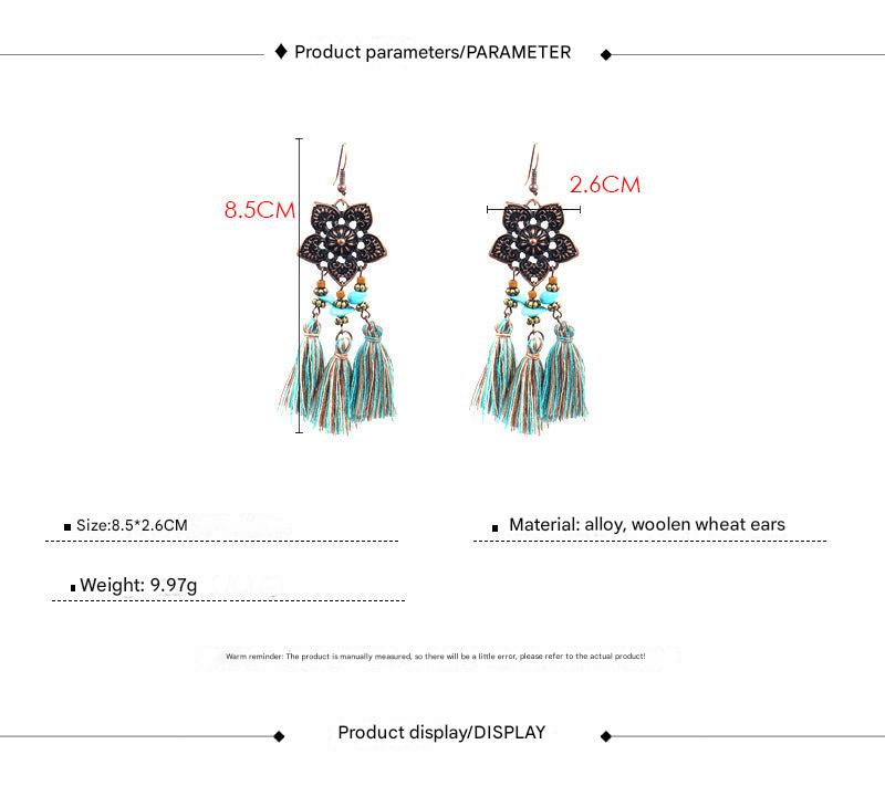 close-up of tassel earrings highlighting details
