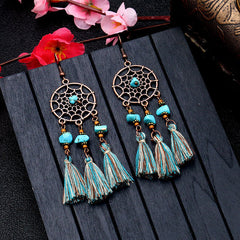 showcasing the lightweight design of tassel earrings