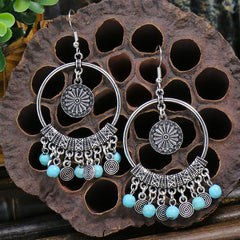 Colourful tassel earrings with geometric design image 4