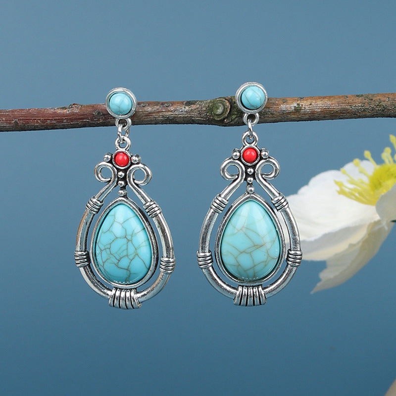 Vibrant tassel earrings on display image 3