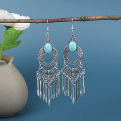 Vibrant tassel earrings on display image 3