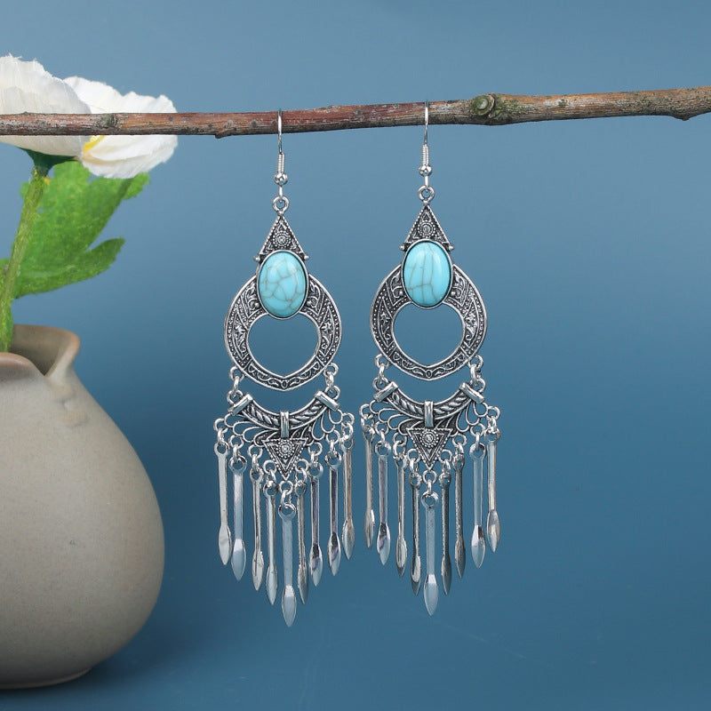 Vibrant tassel earrings on display image 3