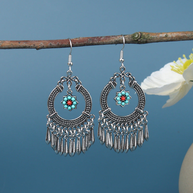 Colourful tassel earrings with geometric design image 4