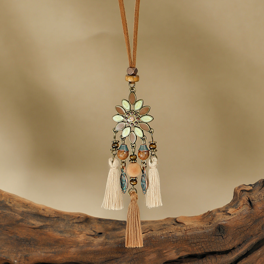 Bohemian long necklace floral pendant close-up