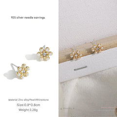 Floral earrings in natural light display 10
