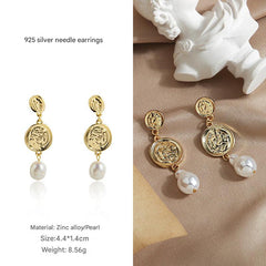 Women wearing vintage flower pearl earrings 6