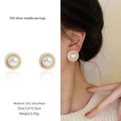 Close-up of flower pearl earrings 3