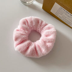 Adorable plush headband displayed on a model