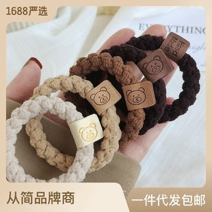 Stylish plush headband for children in black