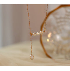 Model showcasing the S925 silver tassel necklace