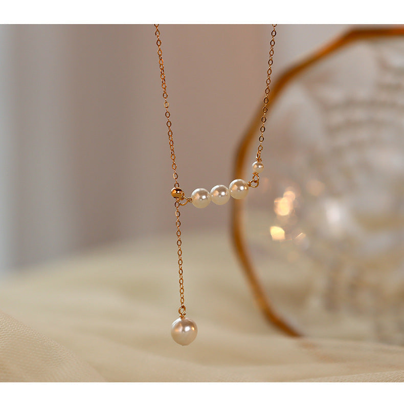 Model showcasing the S925 silver tassel necklace