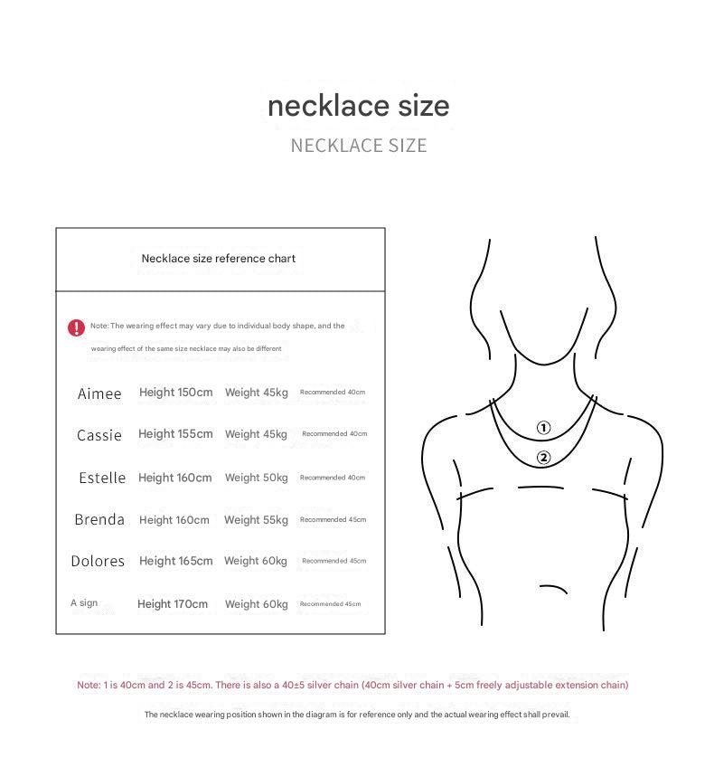 Detailed image of tassel design on silver necklace