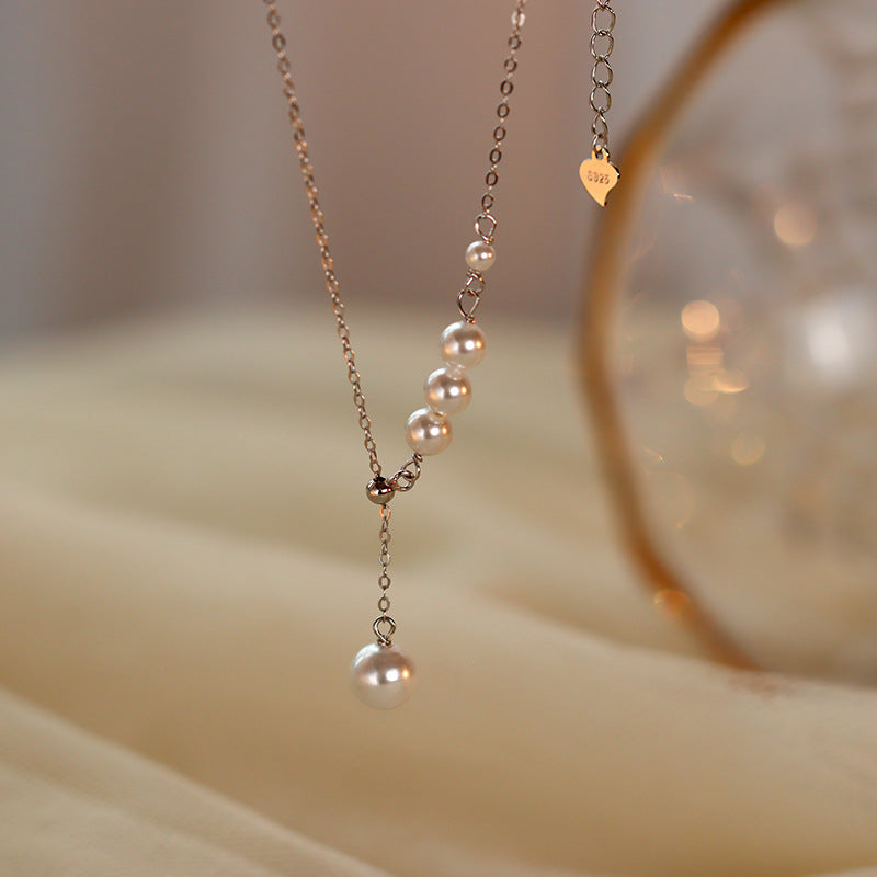 Model showcasing the S925 silver tassel necklace