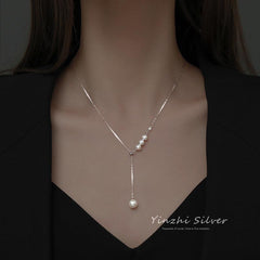 Lifestyle shot of S925 silver necklace in use