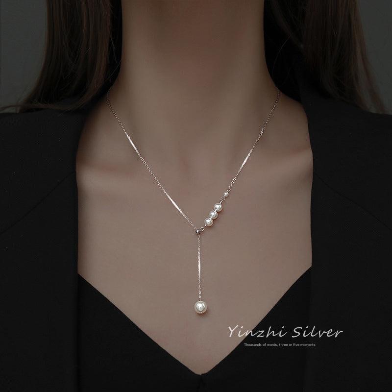 Lifestyle shot of S925 silver necklace in use