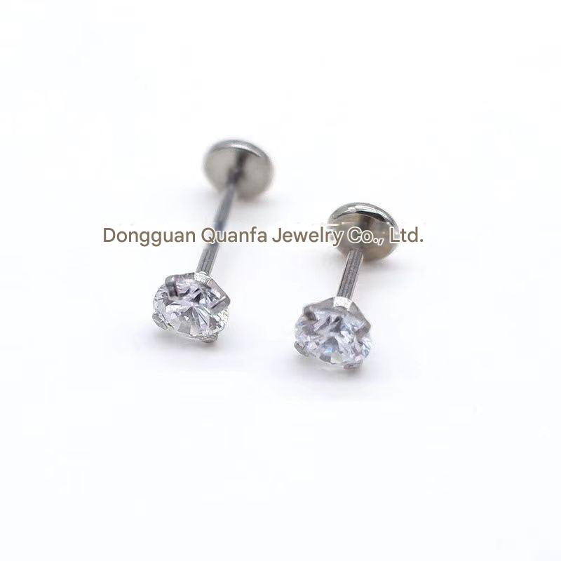 Close-up of geometric lip piercings in stainless steel image 2