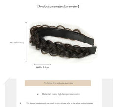 Close-up of stylish wide hairband in black colour