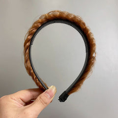 Durable plastic hairband displayed with floral backdrop