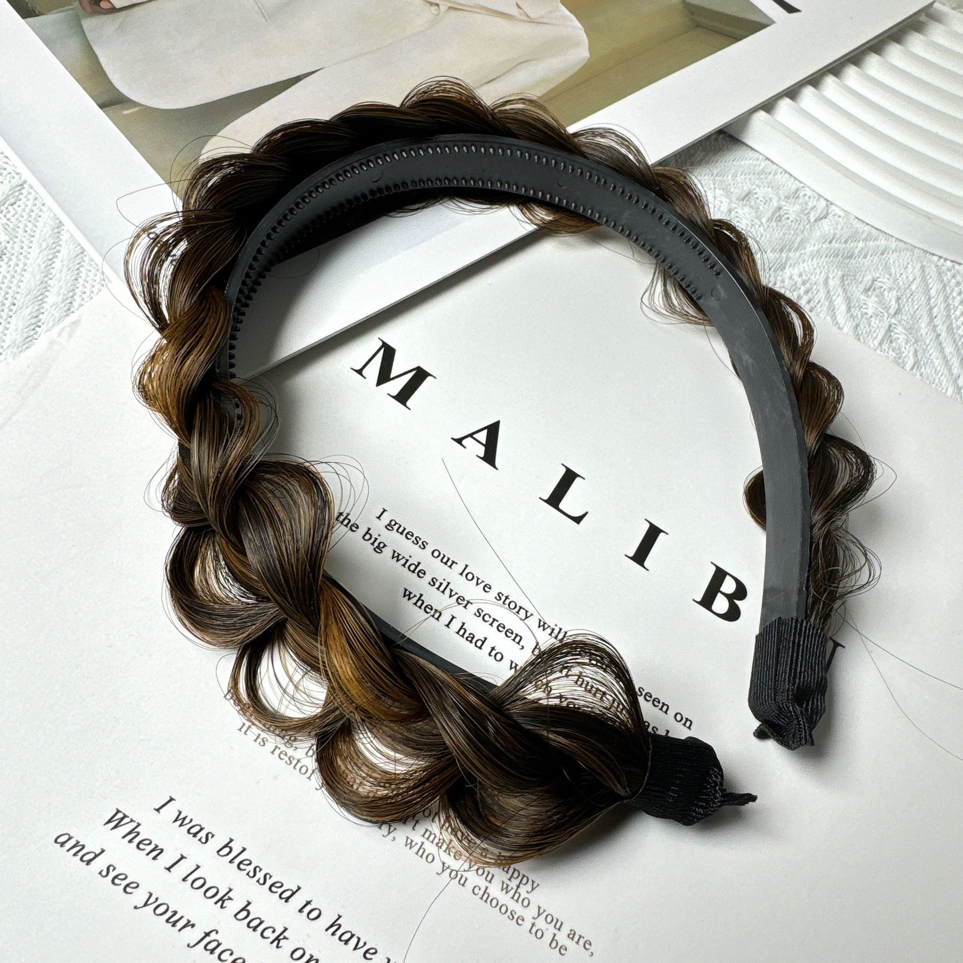 Elegant braided hairband worn with casual outfit