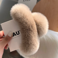 Cozy hair accessory featuring plush rabbit fur