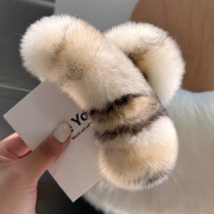 Trendy gray rabbit fur hair clip on displayed model