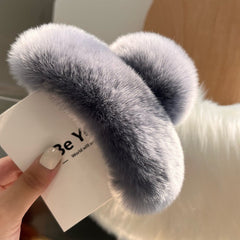 Cozy hair accessory featuring plush rabbit fur